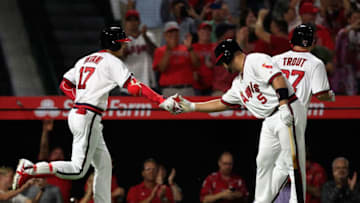 ANAHEIM, CA - AUGUST 27: Shohei Ohtani #17 is congratulated by Albert Pujols #5 and Mike Trout #27 of the Los Angeles Angels of Anaheim after hitting a three-run homerun during the fourth inning of a game against the Colorado Rockies at Angel Stadium on August 27, 2018 in Anaheim, California. (Photo by Sean M. Haffey/Getty Images)