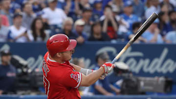 TORONTO, ON - JUNE 19: Mike Trout #27 of the Los Angeles Angels of Anaheim hits a grand slam home run in the fourth inning during MLB game action against the Toronto Blue Jays at Rogers Centre on June 19, 2019 in Toronto, Canada. (Photo by Tom Szczerbowski/Getty Images)