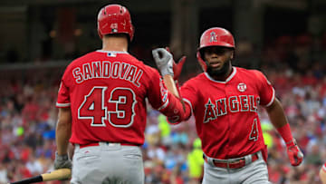 CINCINNATI, OHIO - AUGUST 05: Luis Rengifo #4 of the Los Angeles Angels of Anaheim celebrates with Patrick Sandoval #43 after hitting a home run in the third inning against the Cincinnati Reds at Great American Ball Park on August 05, 2019 in Cincinnati, Ohio. (Photo by Andy Lyons/Getty Images)