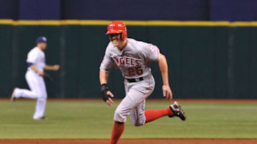 ST. PETERSBURG, FL - AUGUST 27: Outfielder Peter Bourjos #25 of the Los Angeles Angels runs to third base against the Tampa Bay Rays August 27, 2013 at Tropicana Field in St. Petersburg, Florida. The Angels won 6 - 5. (Photo by Al Messerschmidt/Getty Images)