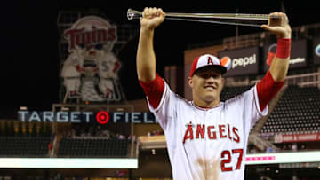 MINNEAPOLIS, MN - JULY 15: American League All-Star Mike Trout #27 of the Los Angeles Angels poses with the MVP trophy after a 5-3 victory over the National League All-Stars during the 85th MLB All-Star Game at Target Field on July 15, 2014 in Minneapolis, Minnesota. (Photo by Elsa/Getty Images)
