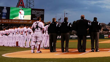 ANAHEIM, CA - APRIL 10: Los Angeles Angels and Boston Red Sox teams line up as Torii Hunter