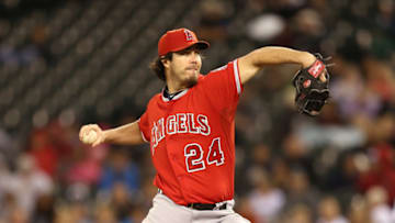 SEATTLE, WA - OCTOBER 02: Starting pitcher Dan Haren #24 of the Los Angeles Angels of Anaheim pitches against the Seattle Mariners at Safeco Field on October 2, 2012 in Seattle, Washington. (Photo by Otto Greule Jr/Getty Images)