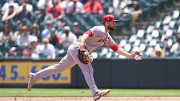 Los Angeles Angels infielder Jared Walsh (20) flips the ball to first to record an out against the San Francisco Giants in the first inning. Mandatory Credit: Cary Edmondson-USA TODAY Sports