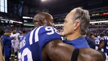Jan 3, 2016; Indianapolis, IN, USA; Indianapolis Colts coach Chuck Pagano hugs linebacker Robert Mathis (98) after the game against the Tennessee Titans at Lucas Oil Stadium. Indianapolis defeats Tennessee 30-24. Mandatory Credit: Brian Spurlock-USA TODAY Sports