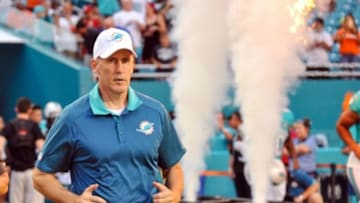 Sep 3, 2015; Miami Gardens, FL, USA; Miami Dolphins head coach Joe Philbin takes the field before a game against the Tampa Bay Buccaneers at Sun Life Stadium. Mandatory Credit: Steve Mitchell-USA TODAY Sports