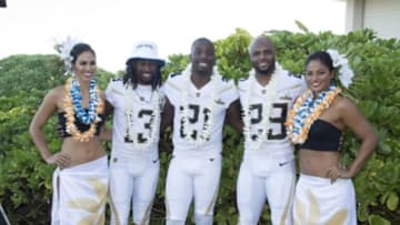 January 29, 2016; Kahuku, HI, USA; Hawaiian hostesses Chelsea Hardin (far left) and Mahina Garcia (far right) pose with Team Rice wide receiver T.Y. Hilton of the Indianapolis Colts (13), Team Rice cornerback Vontae Davis of the Indianapolis Colts (21), and Team Rice strong safety Mike Adams of the Indianapolis Colts (29) during 2016 Pro Bowl photo day at Turtle Bay Resort. Mandatory Credit: Kyle Terada-USA TODAY Sports