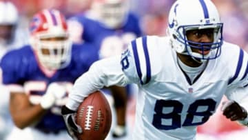 Marvin Harrison #88 of the Indianapolis Colts runs with the football against the Buffalo Bills at Ralph Wilson Stadium on January 2, 2000 in Orchard Park, New York. The Bills defeated the Colts 31-6.January 02, 2000| Credit: Joe Robbins