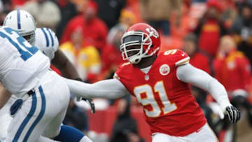 December 22, 2013: Kansas City Chiefs outside linebacker Tamba Hali (91) puts some pressure on Indianapolis Colts quarterback Andrew Luck (12) during the Indianapolis Colts 23-7 victory over the Kansas City Chiefs at Arrowhead Stadium in Kansas City, Missouri.