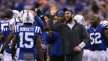 Jan 3, 2016; Indianapolis, IN, USA; Indianapolis Colts quarterback Andrew Luck reacts to the Colts scoring a touchdown against the Tennessee Titans at Lucas Oil Stadium. Mandatory Credit: Brian Spurlock-USA TODAY Sports