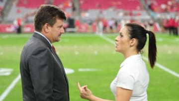 Aug 15, 2015; Glendale, AZ, USA; Arizona Cardinals president Michael Bidwill talks with coaching intern Jen Welter prior to the game against the Kansas City Chiefs in a preseason NFL football game at University of Phoenix Stadium. Mandatory Credit: Matt Kartozian-USA TODAY Sports