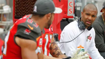 Nov 9, 2014; Tampa, FL, USA; Tampa Bay Buccaneers wide receiver coach Andrew Hayes-Stoker talks on the sidelines during the first quarter against the Atlanta Falcons at Raymond James Stadium. Mandatory Credit: Kim Klement-USA TODAY Sports