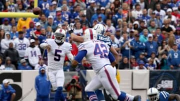 Sep 13, 2015; Orchard Park, NY, USA; Buffalo Bills quarterback Tyrod Taylor (5) throws a pass during the first half against the Indianapolis Colts at Ralph Wilson Stadium. Mandatory Credit: Timothy T. Ludwig-USA TODAY Sports