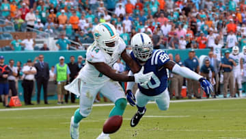 Dec 27, 2015; Miami Gardens, FL, USA; Indianapolis Colts cornerback Darius Butler (20) breaks up a pass intended for Miami Dolphins wide receiver Jarvis Landry (14) during the second half at Sun Life Stadium. The Colts won 18-12. Mandatory Credit: Steve Mitchell-USA TODAY Sports
