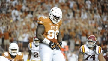 Oct 18, 2014; Austin, TX, USA; Texas Longhorns defensive tackle Hassan Ridgeway (98) reacts against the Iowa State Cyclones during the first half at Darrell K Royal-Texas Memorial Stadium. Texas beat Iowa State 48-45. Mandatory Credit: Brendan Maloney-USA TODAY Sports