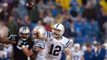 Nov 2, 2015; Charlotte, NC, USA; Indianapolis Colts quarterback Andrew Luck (12) passes the ball during the fourth quarter against the Carolina Panthers at Bank of America Stadium. Carolina defeated Indianapolis 29-26 in overtime. Mandatory Credit: Jeremy Brevard-USA TODAY Sports