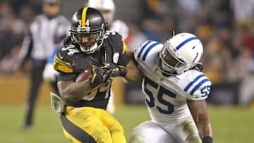 Dec 6, 2015; Pittsburgh, PA, USA; aPittsburgh Steelers running back DeAngelo Williams (34) runs gainst Indianapolis Colts inside linebacker Nate Irving (55)during the fourth quarter at Heinz Field. The Steelers won 45-10. Mandatory Credit: Charles LeClaire-USA TODAY Sports