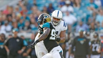 Dec 13, 2015; Jacksonville, FL, USA; Indianapolis Colts tackle Denzelle Good (71) blocks against the Jacksonville Jaguars in the fourth quarter at EverBank Field. The Jaguars won 51-16.Mandatory Credit: Jim Steve-USA TODAY Sports