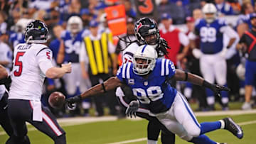 Dec 20, 2015; Indianapolis, IN, USA; Indianapolis Colts linebacker Robert Mathis (98) knocks the ball away from Houston Texans quarterback Brandon Weeden