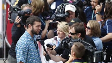 May 24, 2015; Indianapolis, IN, USA; Indianapolis Colts quarterback Andrew Luck is interviewed before the 2015 Indianapolis 500 at Indianapolis Motor Speedway. Mandatory Credit: Aaron Doster-USA TODAY Sports