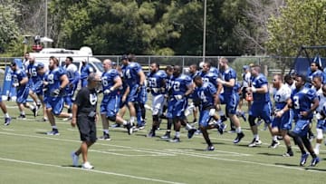 Aug 2, 2015; Anderson, IN, USA; Indianapolis Colts coach Chuck Pagano watches as the Colts run during training camp at Anderson University. Mandatory Credit: Brian Spurlock-USA TODAY Sports