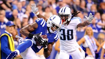 Jan 3, 2016; Indianapolis, IN, USA; Indianapolis Colts receiver Andre Johnson (81) catches a touchdown pass against Tennessee Titans cornerback B.W. Webb (38) at Lucas Oil Stadium. Mandatory Credit: Thomas J. Russo-USA TODAY Sports