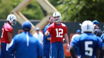 Jun 7, 2016; Indianapolis, IN, USA; Indianapolis Colts quarterback Andrew Luck (12) communicates with his team during mini camp at the Indiana Farm Bureau Center. Mandatory Credit: Brian Spurlock-USA TODAY Sports
