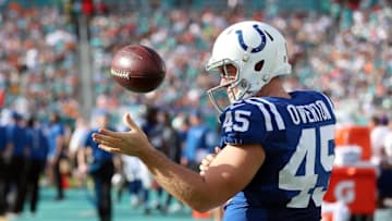 Dec 27, 2015; Miami Gardens, FL, USA; Indianapolis Colts long snapper Matt Overton (45) tosses the football around during the second half against the Miami Dolphins at Sun Life Stadium. The Colts won 18-12. Mandatory Credit: Steve Mitchell-USA TODAY Sports