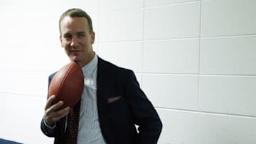 Mar 18, 2016; Indianapolis, IN, USA; Indianapolis Colts retired quarterback Peyton Manning in the Colts practice center hallway after completing his press conference at Indiana Farm Bureau Football Center. Mandatory Credit: Brian Spurlock-USA TODAY Sports