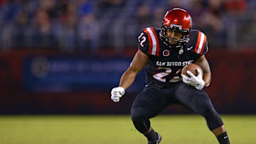 Nov 21, 2014; San Diego, CA, USA; San Diego State Aztecs running back Chase Price (22) runs during the first quarter against the Air Force Falcons at Qualcomm Stadium. Mandatory Credit: Jake Roth-USA TODAY Sports