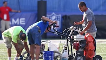 Aug 7, 2016; Canton, OH, USA; Members of the grounds crew tend to the field prior to the 2016 Hall of Fame Game at Tom Benson Hall of Fame Stadium. Mandatory Credit: Aaron Doster-USA TODAY Sports