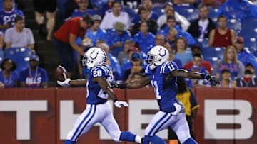 Aug 13, 2016; Orchard Park, NY, USA; Indianapolis Colts running back Jordan Todman (28) runs for a touchdown after catching a pass as wide receiver Quan Bray (11) pursues against the Buffalo Bills during the first half at Ralph Wilson Stadium. Mandatory Credit: Kevin Hoffman-USA TODAY Sports