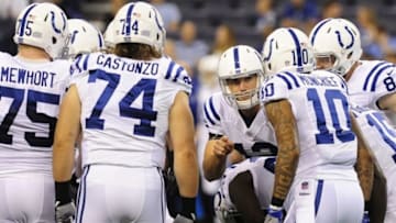Aug 20, 2016; Indianapolis, IN, USA; Indianapolis Colts quarterback Andrew Luck (12) calls a play in the huddle during their game against the Baltimore Ravens at Lucas Oil Stadium. Mandatory Credit: Thomas J. Russo-USA TODAY Sports