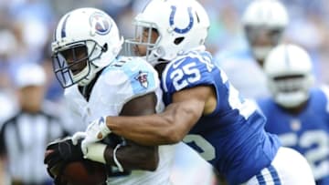 Sep 27, 2015; Nashville, TN, USA; Tennessee Titans receiver Harry Douglas (83) is tackled by Indianapolis Colts defensive back Jalil Brown (25) after a reception during the first half at Nissan Stadium. Mandatory Credit: Christopher Hanewinckel-USA TODAY Sports