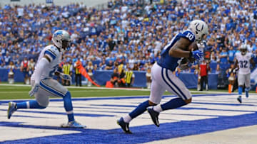 Sep 11, 2016; Indianapolis, IN, USA; Indianapolis Colts wide receiver Donte Moncrief (10) scores a touchdown against Detroit Lions free safety Glover Quin (27) in the first half at Lucas Oil Stadium. The Lions won 39-35. Mandatory Credit: Aaron Doster-USA TODAY Sports