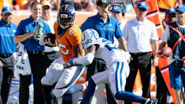 Sep 18, 2016; Denver, CO, USA; Denver Broncos tight end Virgil Green (85) runs the ball against Indianapolis Colts cornerback Darius Butler (20) in the second quarter at Sports Authority Field at Mile High. Mandatory Credit: Isaiah J. Downing-USA TODAY Sports