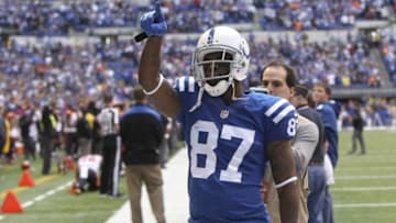 Oct 19, 2014; Indianapolis, IN, USA; Indianapolis Colts wide receiver Reggie Wayne (87) points to fans during introductions before the game against the Cincinnati Bengals at Lucas Oil Stadium. The Colts defeated the Bengals 27-0. Mandatory Credit: Pat Lovell-USA TODAY Sports