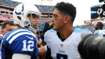 Sep 27, 2015; Nashville, TN, USA; Indianapolis Colts quarterback Andrew Luck (12) and Tennessee Titans quarterback Marcus Mariota (8) after a Colts win at Nissan Stadium. The Colts won 35-33. Mandatory Credit: Christopher Hanewinckel-USA TODAY Sports