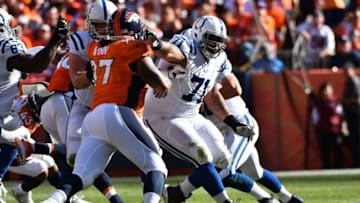 Sep 18, 2016; Denver, CO, USA; Indianapolis Colts offensive tackle Joe Reitz (76) and offensive guard Denzelle Good (71) pass protect on Denver Broncos defensive tackle Billy Winn (97) in the second half at Sports Authority Field at Mile High.The Broncos defeated the Colts 34-20. Mandatory Credit: Ron Chenoy-USA TODAY Sports
