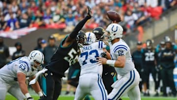 Oct 2, 2016; London, ENG; Indianapolis Colts quarterback Andrew Luck (12) throws a pass against the Jacksonville Jaguars at Wembley Stadium. Mandatory Credit: Steve Flynn-USA TODAY Sports
