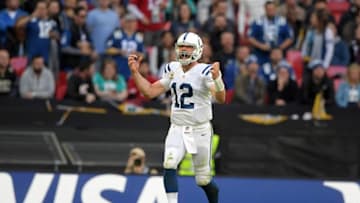 Oct 2, 2016; London, United Kingdom; Indianapolis Colts quarterback Andrew Luck (12) celebrates after throwing a 64-yard touchdown pass in the fourth quarter against the Jacksonville Jaguars at Wembley Stadium. The Jaguars defeated the Colts 30-27. Mandatory Credit: Kirby Lee-USA TODAY Sports