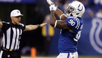 Jan 3, 2016; Indianapolis, IN, USA; Indianapolis Colts defensive end Kendall Langford (90) reacts after deflecting a pass against the Tennessee Titans at Lucas Oil Stadium. Mandatory Credit: Brian Spurlock-USA TODAY Sports