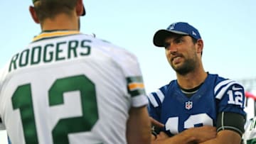 Aug 7, 2016; Canton, OH, USA; Indianapolis Colts quarterback Andrew Luck, right, talks with Green Bay Packers quarterback Aaron Rodgers, left, prior to the 2016 Hall of Fame Game at Tom Benson Hall of Fame Stadium. The game was cancelled due to safety concerns with the condition of the playing surface. Mandatory Credit: Aaron Doster-USA TODAY Sports