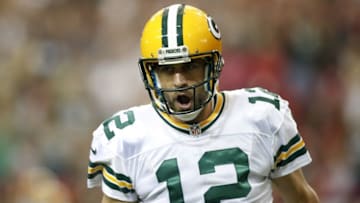 Oct 30, 2016; Atlanta, GA, USA; Green Bay Packers quarterback Aaron Rodgers (12) celebrates after a touchdown pass against the Atlanta Falcons in the first quarter at the Georgia Dome. Mandatory Credit: Brett Davis-USA TODAY Sports