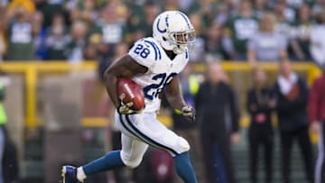 Nov 6, 2016; Green Bay, WI, USA; Indianapolis Colts running back Jordan Todman (28) returns the opening kickoff for a touchdown during the first quarter against the Green Bay Packers at Lambeau Field. Mandatory Credit: Jeff Hanisch-USA TODAY Sports