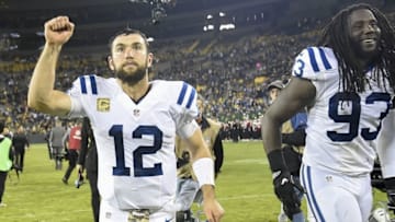 Nov 6, 2016; Green Bay, WI, USA; Indianapolis Colts quarterback Andrew Luck (12) walks off the field with linebacker Erik Walden (93) after the game against the Green Bay Packers at Lambeau Field. The Colts beat the Packers 31-26. Mandatory Credit: Benny Sieu-USA TODAY Sports