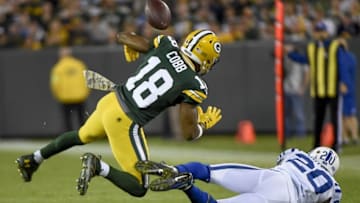 Nov 6, 2016; Green Bay, WI, USA; Green Bay Packers wide receiver Randall Cobb (18) fumbles the ball after being tackled by Indianapolis Colts cornerback Darius Butler (20) in the third quarter but the Packers retained possession at Lambeau Field. Mandatory Credit: Benny Sieu-USA TODAY Sports