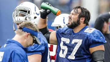 Jul 28, 2016; Anderson, IN, USA; Indianapolis Colts offensive lineman Jeremy Vujnovich (67) cools off after a drill during the Indianapolis Colts NFL training camp at Anderson University. Mandatory Credit: Mykal McEldowney/Indy Star via USA TODAY NETWORK