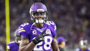 Sep 18, 2016; Minneapolis, MN, USA; Minnesota Vikings running back Adrian Peterson (28) poses for a photo against the Green Bay Packers at U.S. Bank Stadium. The Vikings defeated the Packers 17-14. Mandatory Credit: Brace Hemmelgarn-USA TODAY Sports