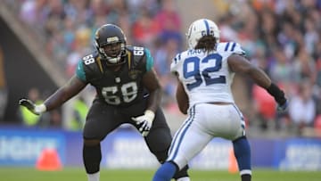 Oct 2, 2016; London, United Kingdom; Jacksonville Jaguars tackle Kelvin Beachum (68) defends against Indianapolis Colts outside linebacker Curt Maggitt (92) during game 15 of the NFL International Series at Wembley Stadium. The Jaguars defeated the Colts 30-27. Mandatory Credit: Kirby Lee-USA TODAY Sports